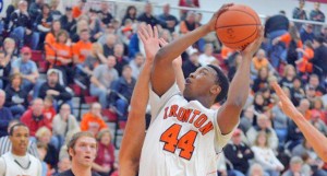 Ironton Fighting Tigers’ Trey Fletcher (44) scores inside against Wheelersburg as he gets two of his 18 points. Ironton beat Wheelersburg 49-39 Friday to win the Division III sectional tournament. (Kent Sanborn of Southern Ohio Sports Photos)