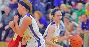 St. Joseph Female Flyers’ guard Hannah Miller (right) drives to the basket using a screen set by teammate Hannah Martin during Thursday’s Division IV district semifinal game against South Gallia. The Female Flyers lost 33-29. (Kent Sanborn of Southern Ohio Sports Photos)