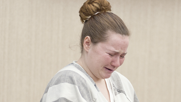 Ashley Seagraves cries during her sentencing Tuesday in Lawrence County Common Pleas Court. Seagraves was sentenced to life in prison for the murder of Delmar Jenkins. She will not be eligible for parole until she has served at least 23 years in prison.