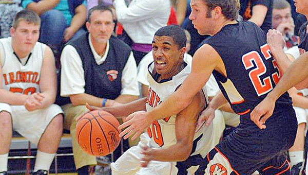Ironton senior guard Zac Carter (30) was the Ohio National Guard/JJHuddle Division III state Player of the Year, and the Fighting Tigers’ Mark LaFon was the Ohio High School Basketball Coaches Association Division III state Coach of the Year. (Kent Sanborn of Southern Ohio Sports Photos.com)