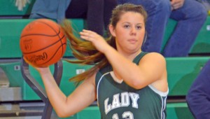 Fairland Lady Dragons’ Chandler Fulks (12) looks to pass the ball to a teammate. Fulks scored 11 points but the Lady Dragons lost 53-47 to Johnstown-Monroe on Wednesday in the Division III regional semifinals. (Kent Sanborn of Southern Ohio Sports Photos.com)