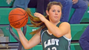 Fairland Lady Dragons’ Chandler Fulks (12) looks to pass the ball to a teammate. Fulks scored 11 points but the Lady Dragons lost 53-47 to Johnstown-Monroe on Wednesday in the Division III regional semifinals. (Kent Sanborn of Southern Ohio Sports Photos.com)