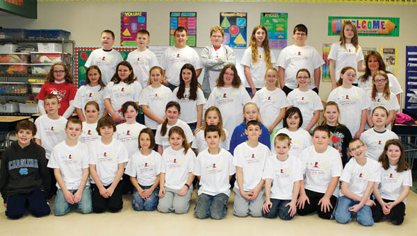 Coal Grove Elementary School students wear shirts they earned by participating in the school’s Math-A-Thon.