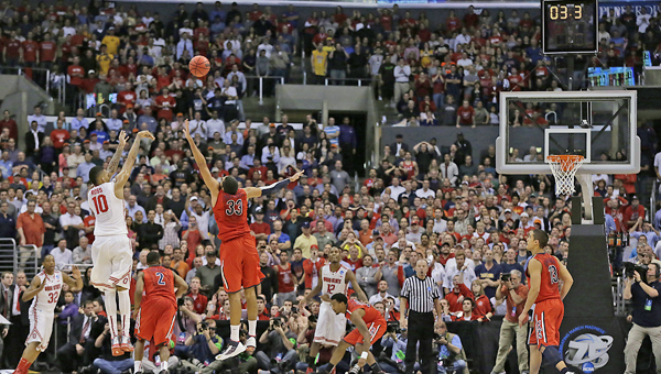 Ohio State’s LaQuinton Ross (10) hits the game-winning 3-pointer in the waning seconds of a 73-70 triumph against Arizona in the NCAA Tournament Sweet 16 game at Staples Center in Los Angeles on Thursday. (MCT Direct Photo)