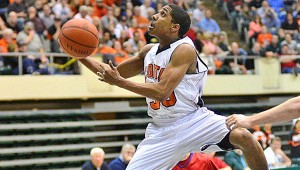 Ironton’s Zac Carter makes a layup against Zane Trace in the Fighting Tigers 69-45 Div. III district championship win. Ironton plays Martins Ferry at 6:15 p.m. Wednesday at Ohio University in the regional semifinals. (Kent Sanborn of Southern Ohio Sports Photos)