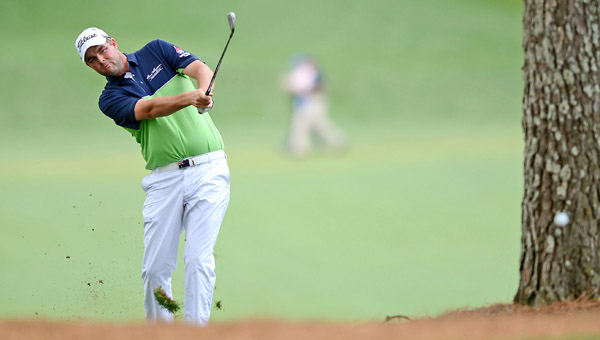 Marc Leishman hits his second shot on the 17th hole on his way to shooting six under in the opening round of the Masters Tournament at Augusta National Golf Club in Augusta, Ga., Thursday. (MCT Direct Photo)