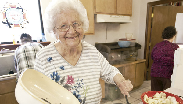 Hazel Clark, with the ladies auxiliary, cooks up a batch of ramps and potatoes during the annual dinner at the Proctorville VFW Post 6878 Saturday.