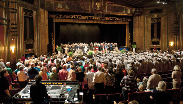 Graduates of Ashland Community & Technical College make their way into the Paramount Arts Center for the 2013 commencement Saturday.