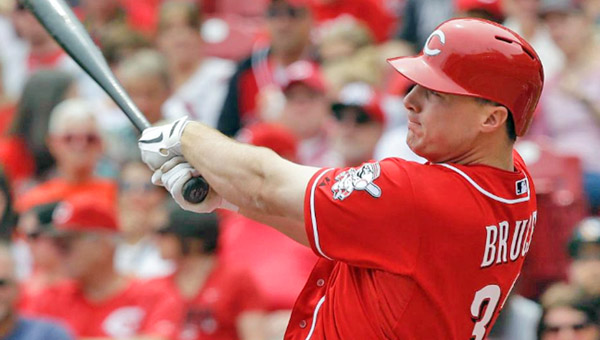 Cincinnati Reds' outfielder Jay Bruce connects for his seventh home run of the season during Sunday's game. The Reds built a 4-1 lead but the bullpen was unable to secure the victory as the Cubs won 5-4 in 10 innings. (Courtesy of the Cincinnati Reds.com)