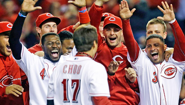 Shin-Soo Choo (17) is greeted at home plate by his Cincinnati teammates after his two-out, ninth inning walk-off home run gave the Reds a 5-4 win over the Atlanta Braves on Tuesday. (Photo Courtesy of The Cincinnati Reds)