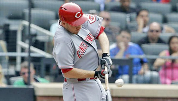 Cincinnati third baseman Todd Frazier connects for a two-run single during the ninth inning as the Reds scored three times and beat the New York Mets 7-4 on Wednesday. (Photo Courtesy of The Cincinnati Reds)