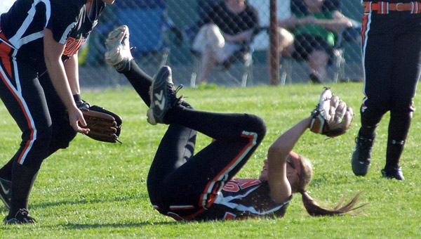 Ironton Lady Fighting Tigers’ second baseman Andi Kratzenberg makes a diving catch in Wednesday game at Fairland. Ironton won 3-1. (Kent Sanborn of Southern Ohio Sports Photos.com)