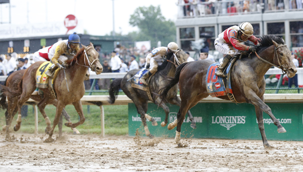 Orb, with Joel Rosario up, captures the 139th running of the Kentucky Derby at Churchill Downs in Louisville, Kentucky, on Saturday. (The Ironton Tribune / MCT Direct Photos)