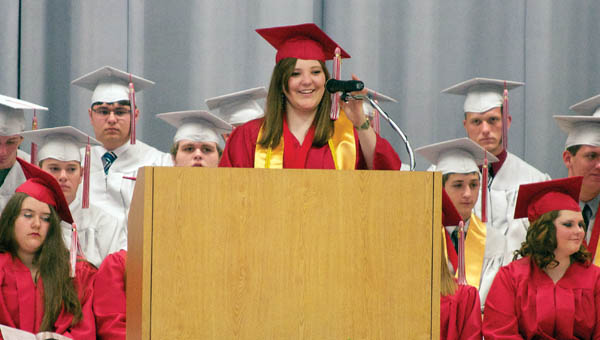 Symmes Valley High School class of 2013 valedictorian Michaela Sheppard begins her speech during the school’s commencement program Sunday.