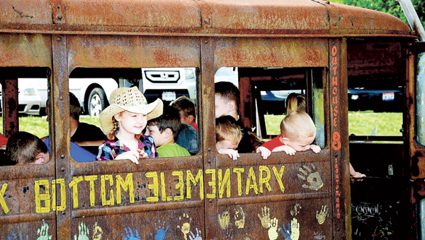 Rock Hill Preschool students have fun in the hillbilly bus during a visit from the Shriners Club. The children contributed $793.38, gathered over a period of a month, for Pennies for Shriners.