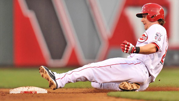 Cincinnati catcher Ryan Hanigan slides safely into second base with a run-scoring double during Tuesday's game. The Reds were unable to hold onto a 4-3 lead as the Colorado Rockies rallied in the eighth inning to win 5-4. (Photo Courtesy of the Cincinnati Reds.com)