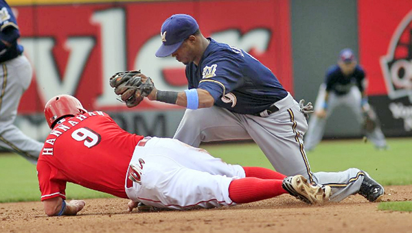Cincinnati Reds’ third baseman Jack Hannahan (9) dives safely back into second base as Jean Segura tries to tag him in the fourth inning. (Photo Courtesy of The Cincinnati Reds)