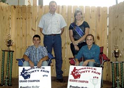 Markie Norris won the grand champion trophy in the beef breeding heifer category. Ann-Michal Dyer won reserve champion and senior showman for beef breeding heifer. Also pictured are cattle judge Neal Branscum, from Nancy, Ky., and Lawrence County Fair Queen Skye Barnett.