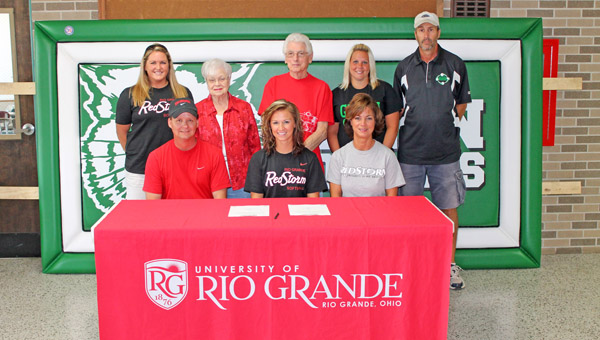 Green Lady Bobcats senior softball standout Jenna Crawford signed a letter-of-intent to play for the University of Rio Grande next season. Attending the signing ceremony were: seated from left to right, father Rocky Crawford, Jenna, and mother Kathy Crawford; standing from left to right, Rio Grande head coach Kristen Bradshaw, grandmother Patty Roadcup, grandfather Orion Roadcup, Green coach Erika Merrill and Green head coach Dale Royse. (Photo Courtesy Randy Payton of The University of Rio Grande)