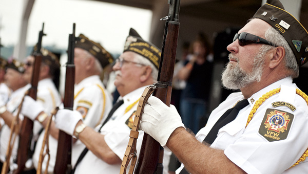 VFW Post 6878 Honor Guard stands at attention during opening ceremonies Monday at the Lawrence County Fair. Events at the fair this week include figure 8 races, rodeo, live entertainment and a demolition derby.