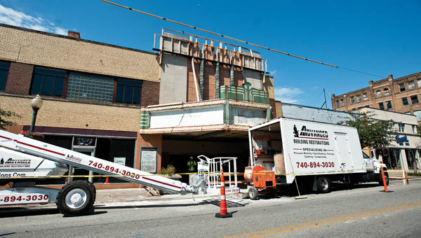 Advanced Building Restorations continues work on the Ro-Na Theater. For a pictorial tour, see page 1C.