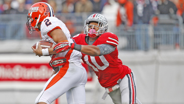 Ohio State Buckeyes linebacker Ryan Shazier (10) tackles Illinois Fighting Illini quarterback Nathan Scheelhaase (2) during a game last season. Shazier is one of the keys to the Buckeyes’ defense this season. (MCT Direct Photo)