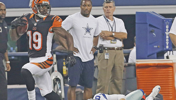 Cincinnati Bengals’ Brandon Tate (19) had a 75-yard punt return for a touchdown during the first half of an NFL preseason game at Dallas Saturday. The Bengals lost 24-18. (MCT Direct Photos)