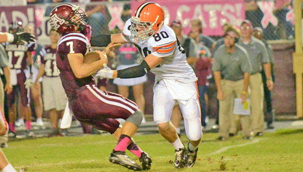 Ironton Fighting Tigers’ defensive end Joe Bowling (80) brings down Ashland quarterback Hunter Prince during last week’s game. Ironton hosts Portsmouth at 7:30 p.m. Friday. (Tony Shotsky of Southern Ohio Sports Photos)