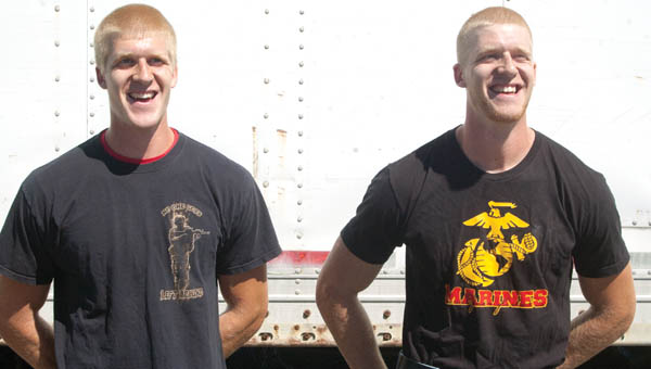 The Lange brothers, Michael, left, and John, right, have both enlisted in the Marines. The brothers are 2012 graduates of Fairland High School.