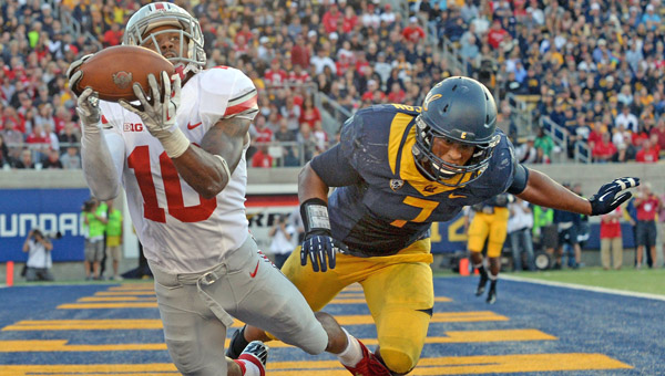 Cal's Jalen Jefferson (7) can't stop a diving touchdown catch by Ohio State's Philly Brown (10) in the second half at Memorial Stadium in Berkeley, Calif., on Saturday. Ohio State won 52-34. (MCT Direct)