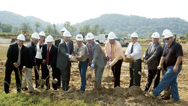 A ceremonial groundbreaking was held Tuesday across from the Lawrence County Fairgrounds for an 87-unit senior living community. Pictured, from left to right, are Scott Shroyer, director of operations for Chancellor Senior Management; Bill Pratt, Lawrence County Commissioner; Stacie Stoll, sales and marketing director for Chancello; Brent Marsteller, president and CEO of Cabell Huntington Hospital; Mike DePaola, Chancellor CFO; Bill Dingus, executive director of the Greater Lawrence County Area Chamber of Commerce; Rob Calloway, site contractor for Wallick Construction; Roger Vincent, president and founder of Chancellor; Freddie Hayes, Lawrence County Commissioner; Les Boggs, Lawrence County Commissioner; Bill Lepper, president of Wallick Construction; Bill Andrews, owner of Andrews Architects; and Tom Kaichner, project manager for Wallick Construction.