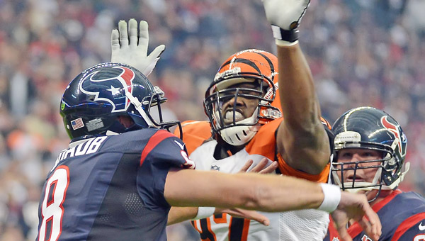 Cincinnati Bengals’ defensive lineman Geno Atkins (97) pressures Houston quarterback Matt Schaub during a game last season. (MCT Direct Photos)