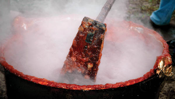 The apple butter made at the Lawrence Furnace Church must be churned for hours a day. The Church has been making the preservative for 70 years.