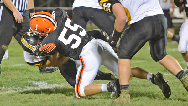 Ironton Fighting Tigers’ Zach Miller (55) makes the stop on a Johnson Central runner during a game earlier this season. Ironton hosts Oak Hill on senior night Friday. (Tony Shotsky of Southern Ohio Sports Photos)