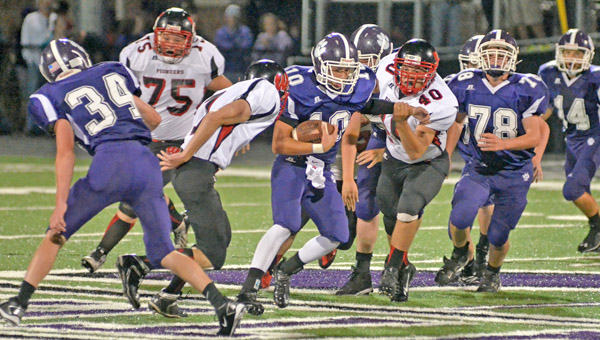Chesapeake Panthers' quarterback Austin Oldaker looks to run wide behind his offensive line in a game earlier this season. The Panthers visit the Fairland Dragons Friday. (Kent Sanborn of Southern Ohio Sports Photos.com)
