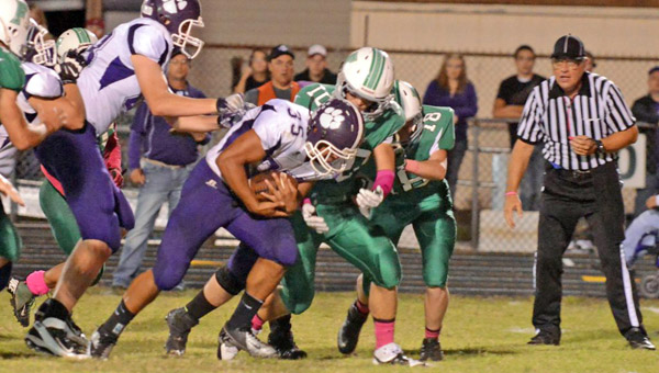 Fairland Dragons’ Kyle Sowards (10) goes to bring down Chesapeake Panthers’ running back Maccoy Brown (35). The Dragons play at Coal Grove Friday in a showdown for first place in the OVC. (Tony Shotsky of Southern Ohio Sports Photos.com)