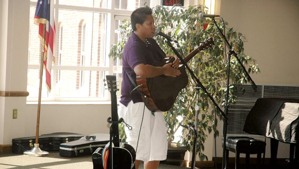 Cat Cirner, a former Ohio University Southern student, performs to a packed Mains Rotunda on Wednesday as part of the school’s Brown Bag Concert Series. Cirner calls herself a balladeer and performed some of her own songs as well as tunes by the Indigo Girls, Sheryl Crow and Bob Dylan.