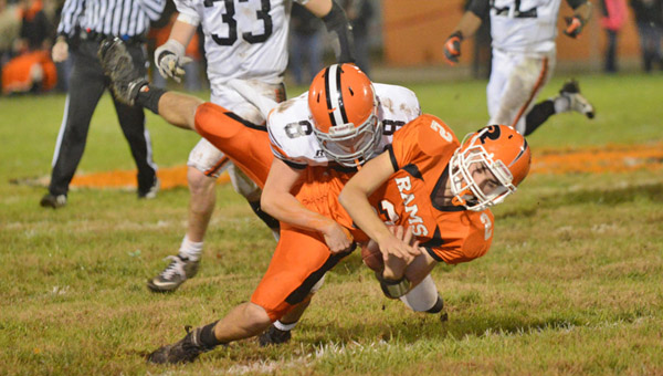 Ironton Fighting Tigers’ defensive back Tristan Cox (8) makes a hard hit on Raceland wide receiver Rodney Vance during Friday’s game. Raceland managed to beat Ironton 17-0. (Tony Shotsky of Southern Ohio Sports Photos)