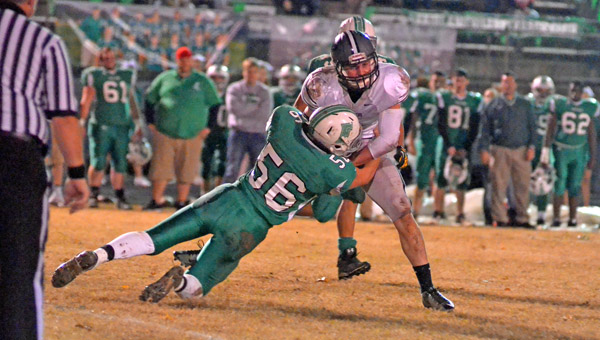 Fairland Dragons’ linebacker Clayton Edmonds (56) brings down at River Valley runner during a game last week. The Dragons’ defense will be a key when Fairland visits Wheelersburg Saturday in the Division V playoffs. (Kent Sanborn of Southern Ohio Sports Photos)