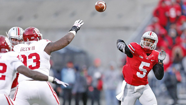 Ohio State Buckeyes’ quarterback Braxton Miller (5) throws a pass against Indiana. Ohio State head coach Urban Meyer thinks Miller has a future as an NFL quarterback. (MCT Direct Photos)