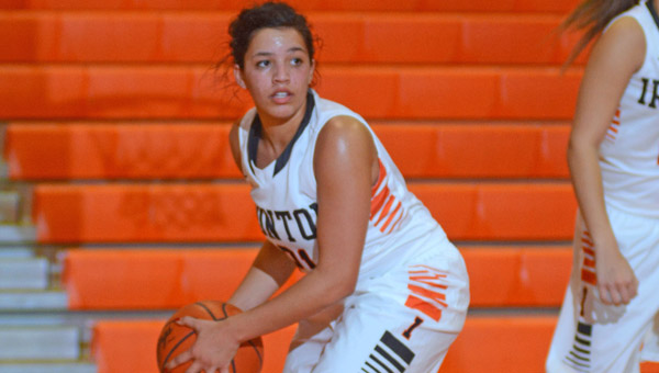 Ironton Lady Fighting Tigers’ Macy Wise looks to pass to a teammate after grabbing a rebound. Ironton routed Westfall 56-37 Monday. (Kent Sanborn of Southern Ohio Sports Photos)