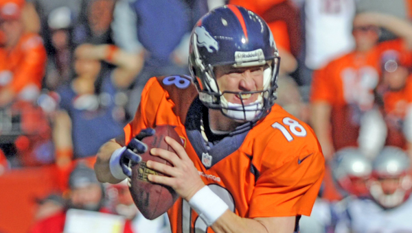 Denver Broncos quarterback Peyton Manning readies to unleash a touchdown pass to tight end Jacob Tamme in the second quarter of the AFC championship game against the New England Patriots at Sports Authority Field at Mile High in Denver on Sunday. The Broncos defeated the Patriots, 26-16. (MCT Direct)