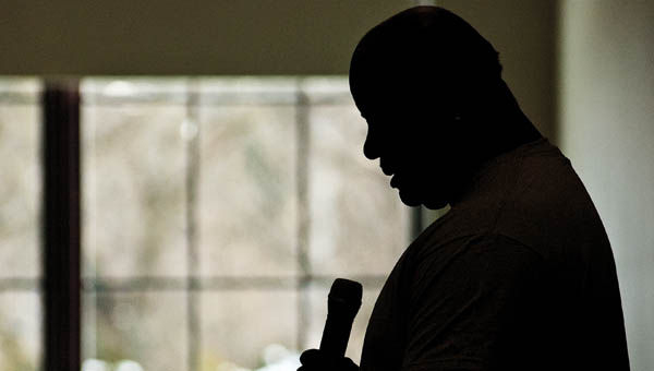 Ohio Southern University student Kenneth Collins recites quotes from Dr. Martin Luther King Jr. during the Dr. Martin Luther King Jr. OUS Commemorative Celebration Friday at the Proctorville Center.