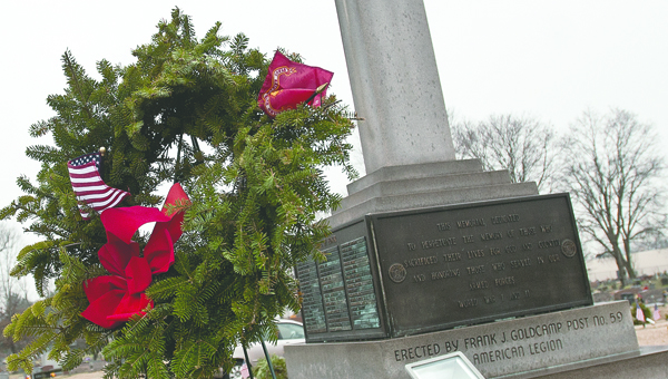 THE TRIBUNE/JESSICA ST JAMES More than 900 wreaths can be viewed at the Soldiers Section at Woodland Cemetery. Organizers Linda Dalton and Juanita Southers, with Wreaths Across America, are looking for volunteers to help remove wreaths at Woodland Cemetery on Saturday, Jan. 11.