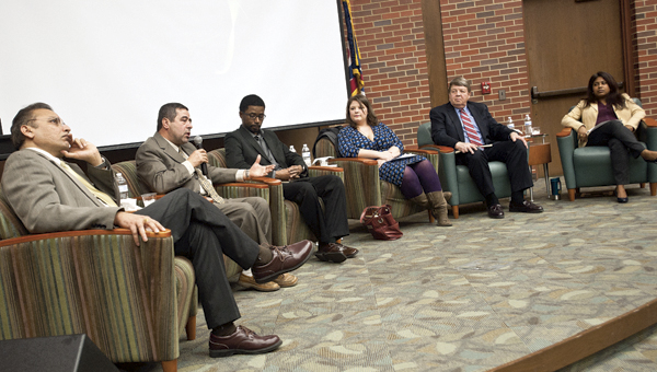 THE TRIBUNE/JESSICA ST JAMES Panelist members Dr. Jagan Valluri, Dr. Majed Khader, Rev. Sneed and Amanda White, pictured left to right, seen with moderators Dr. John Webster and Dr. Purba Das convene at Ohio University Southern for a Interfaith Dialogue: Finding Our Common Ground event. The dialogue allows communication with other people who have different traditions and faiths from their own.