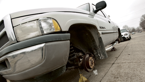 THE TRIBUNE/JESSICA ST JAMES A truck, owned by Buddy and Marci Kleinman of Ironton, needs to have two tires replaced. Vehicles up and down the 2700 blocks on 10th and 11th streets were the object of tire slashing vandalism early Monday morning.