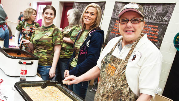 The ladies of the National Wild Turkey Federation served their chili during the annual Chili Fest and Craft Show for DD Awareness event Saturday at Dawson-Bryant High School.