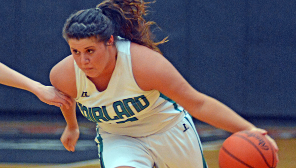 Fairland Lady Dragons’ Chandler Fulks brings the ball up the court. Fairland beat McClain 64-42 in the regional semifinals Wednesday. (Kent Sanborn of Southern Ohio Sports Photos)
