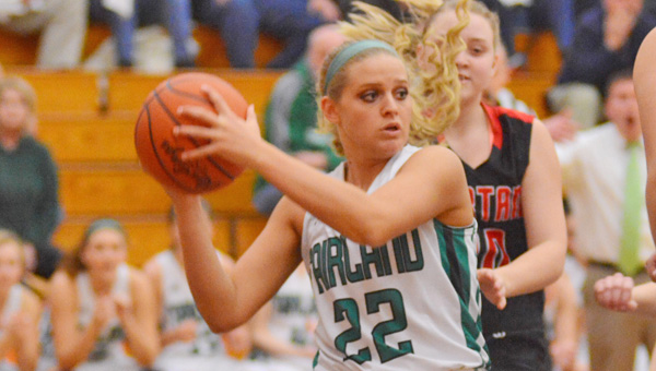 Fairland Lady Dragons’ Kelsey Riley (22) looks to make an outlet pass after grabbing a rebound during Saturday’s 62-37 Div. III district championship win over Albany Alexander. (Kent Sanborn of Southern Ohio Sports Photos)
