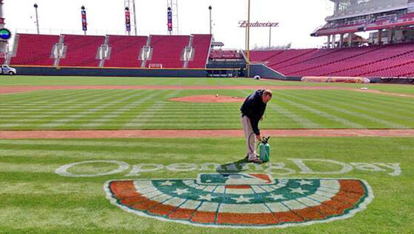 Ground crew members prepare the field at Great American Ball Park for Opening Day on Monday when the Cincinnati Reds host the St. Louis Cardinals. First pitch is scheduled for 4:10 p.m. (Photo Courtesy of The Cincinnati Reds)
